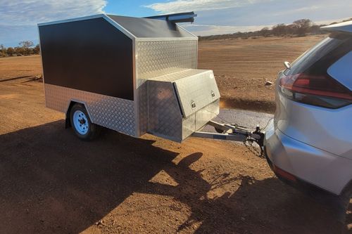 Two Wheeled Covered Trailer With Ramp 